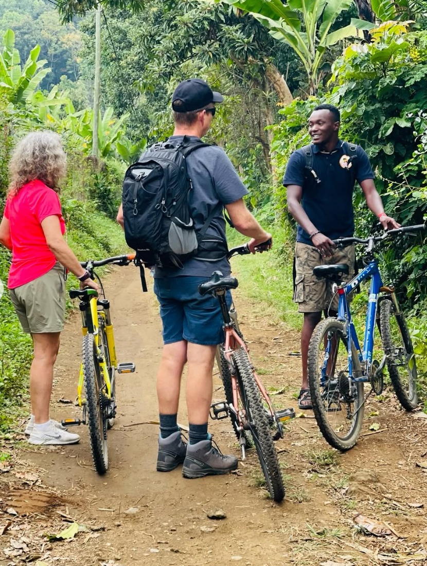 Guests exploring northern Tanzania by bicycle with a local guide